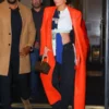 Kylie Jenner dazzles in an orange leather jacket
