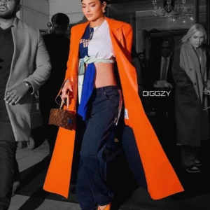 Kylie Jenner dazzles in an orange leather jacket for sale
