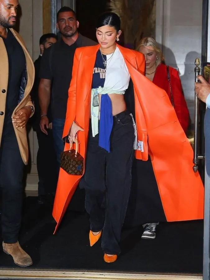buy Kylie Jenner dazzles in an orange leather jacket