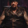 Undertaker Looking for Cena Brown Leather Vest