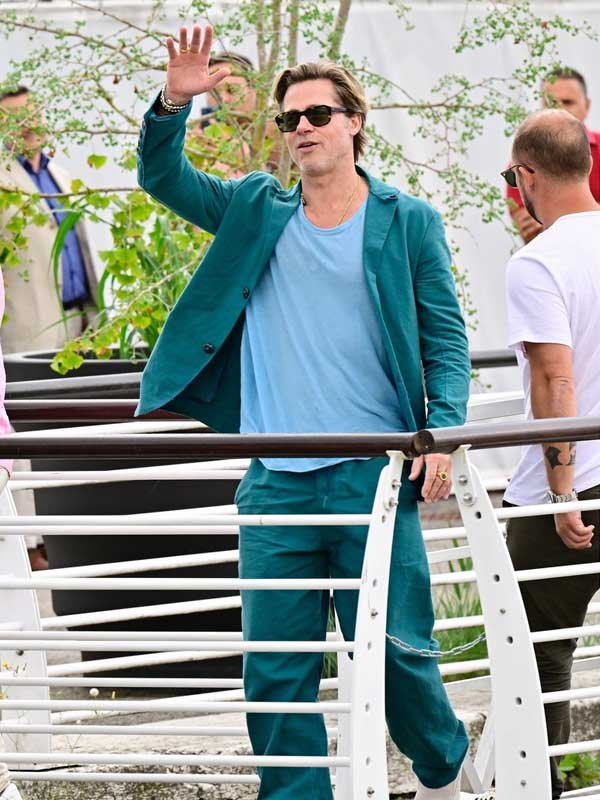 1. Stylish Teal Three Piece Suit